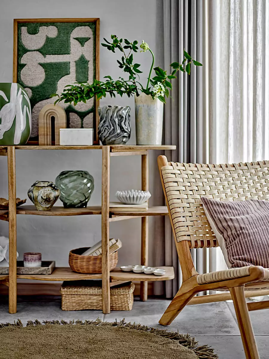 Bookcase made of mango wood in natural color with wavy shelves